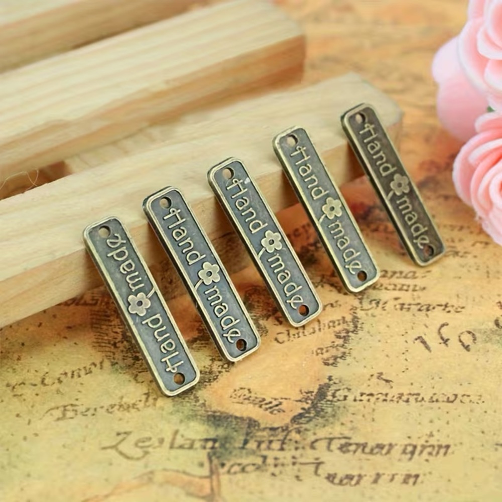 25 METAL “HAND MADE” TAGS